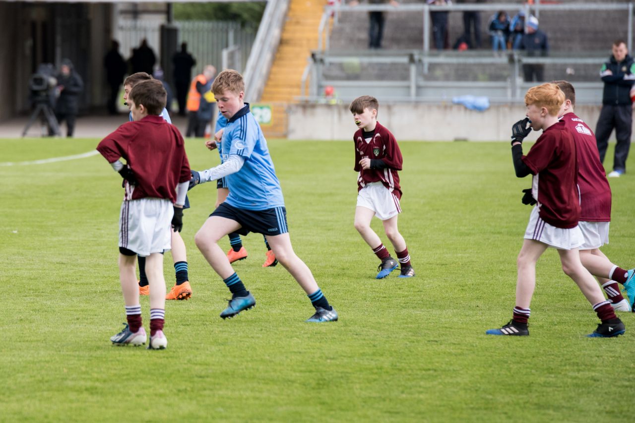 U12 Footballers Play at Half time in All Ireland U21 Football Final