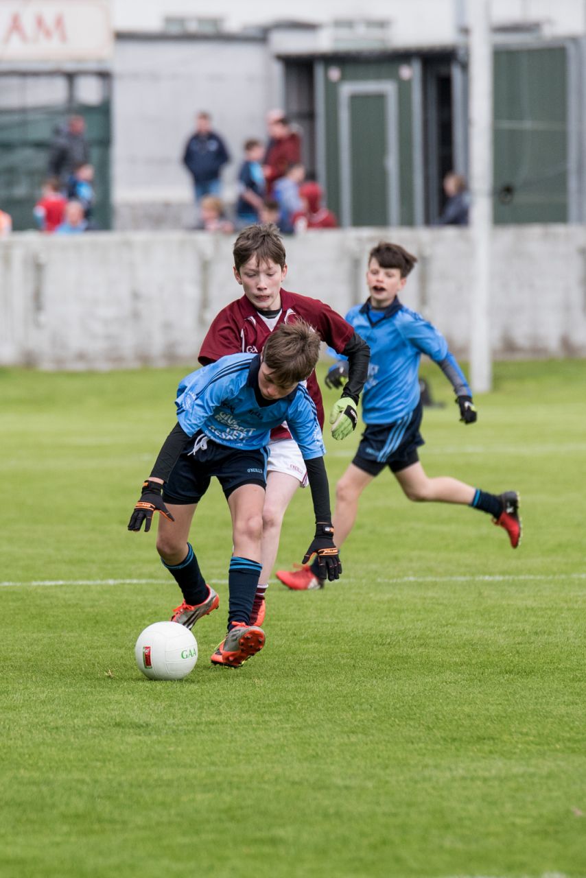 U12 Footballers Play at Half time in All Ireland U21 Football Final