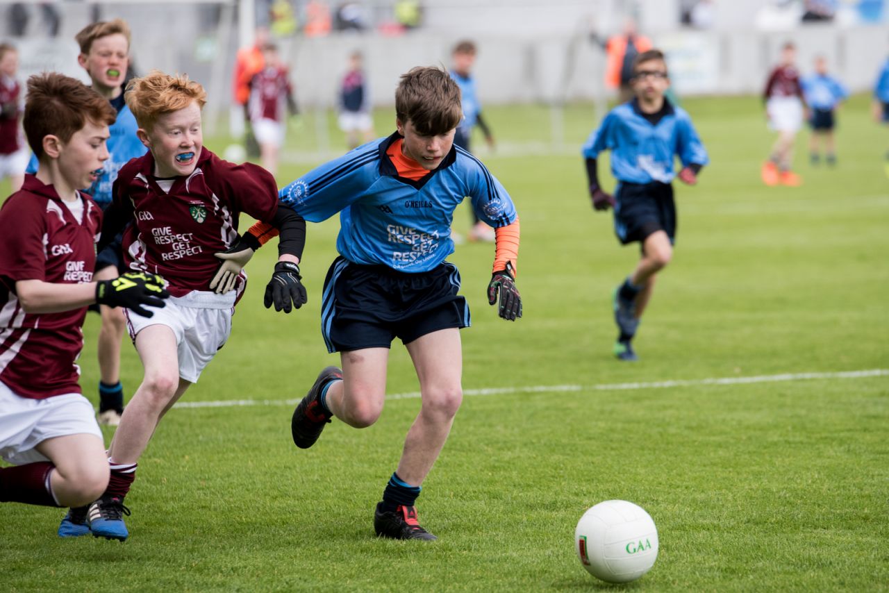 U12 Footballers Play at Half time in All Ireland U21 Football Final