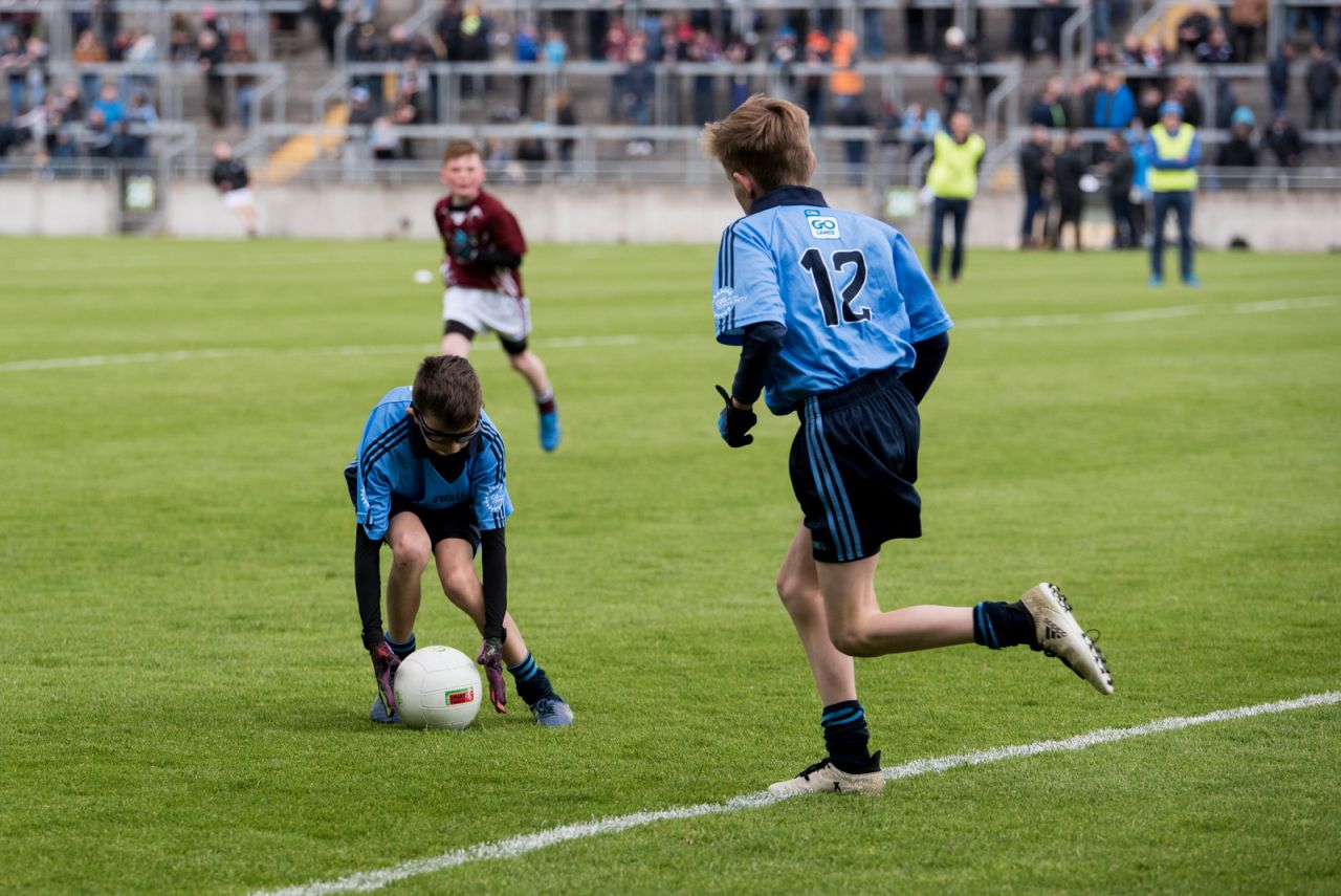 U12 Footballers Play at Half time in All Ireland U21 Football Final