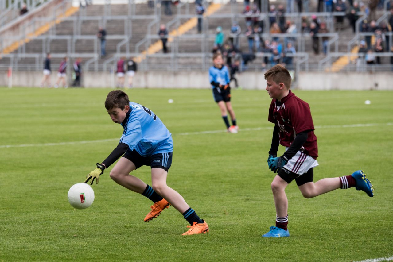 U12 Footballers Play at Half time in All Ireland U21 Football Final