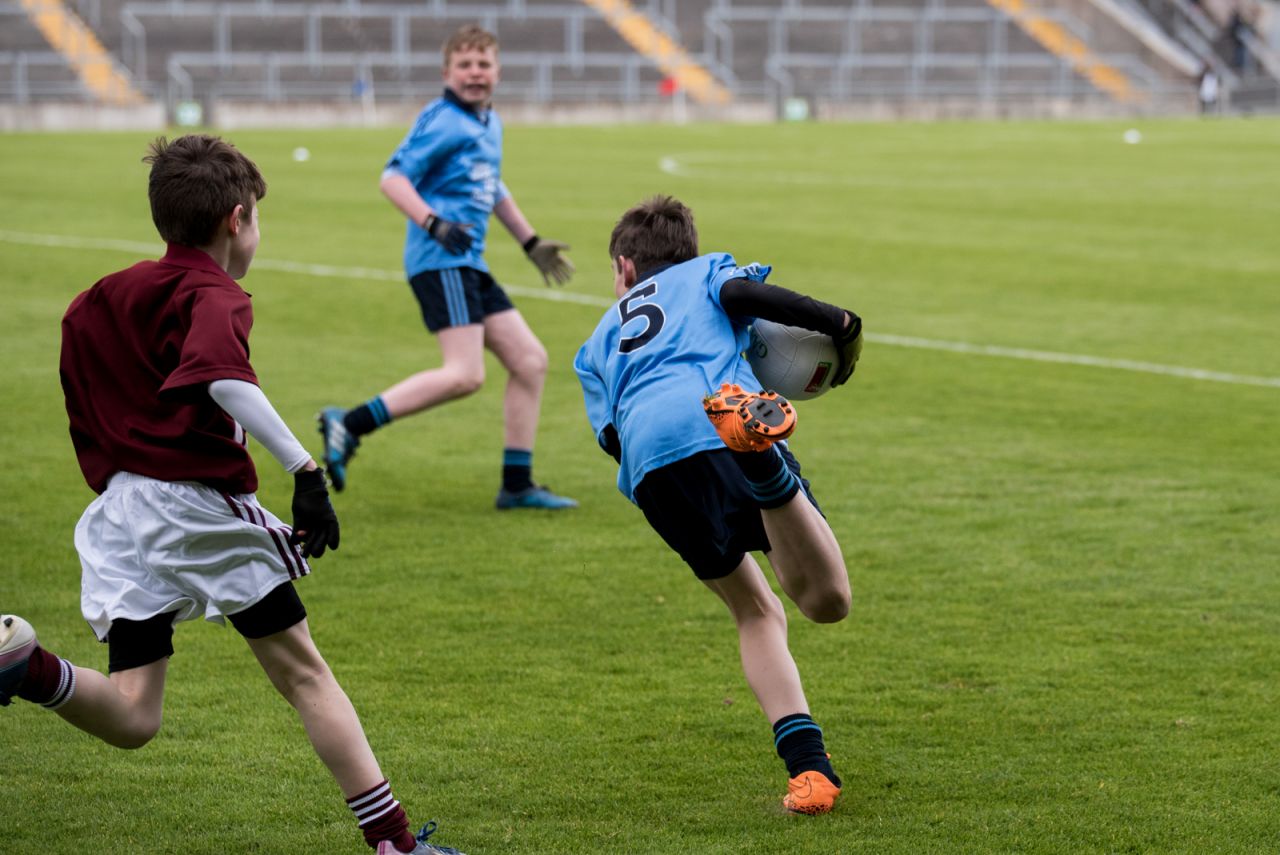 U12 Footballers Play at Half time in All Ireland U21 Football Final