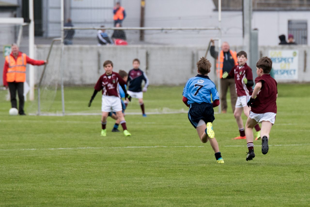 U12 Footballers Play at Half time in All Ireland U21 Football Final