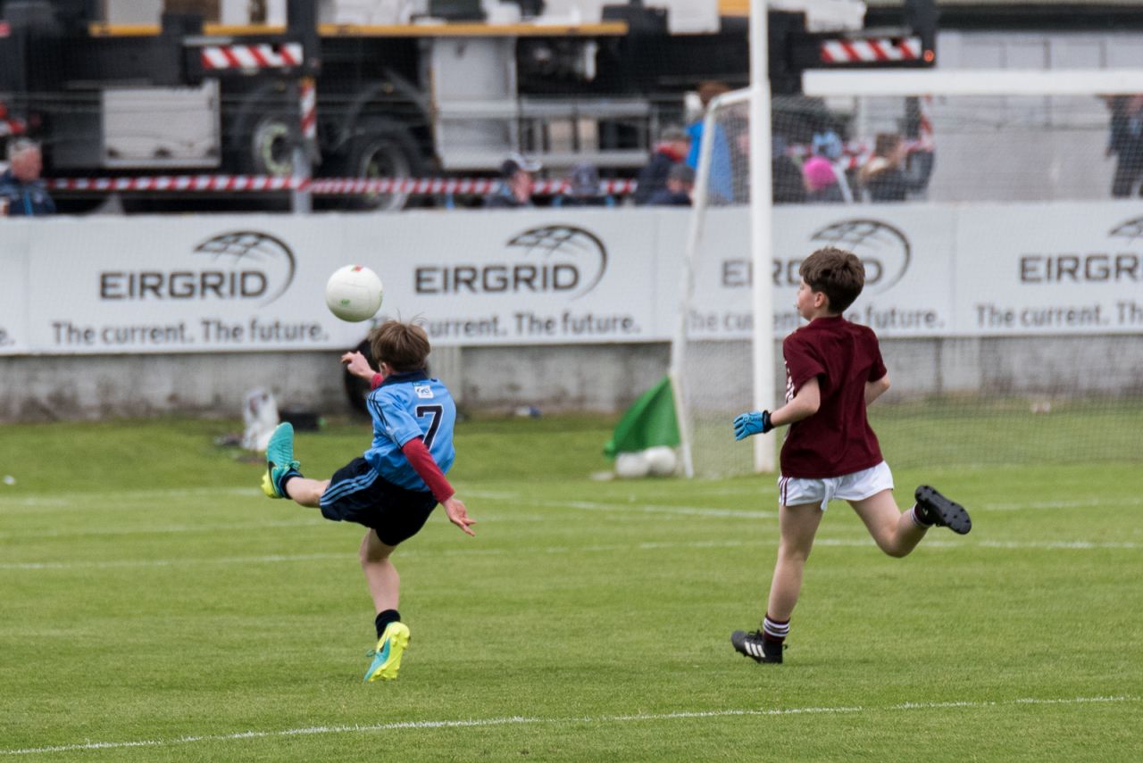 U12 Footballers Play at Half time in All Ireland U21 Football Final