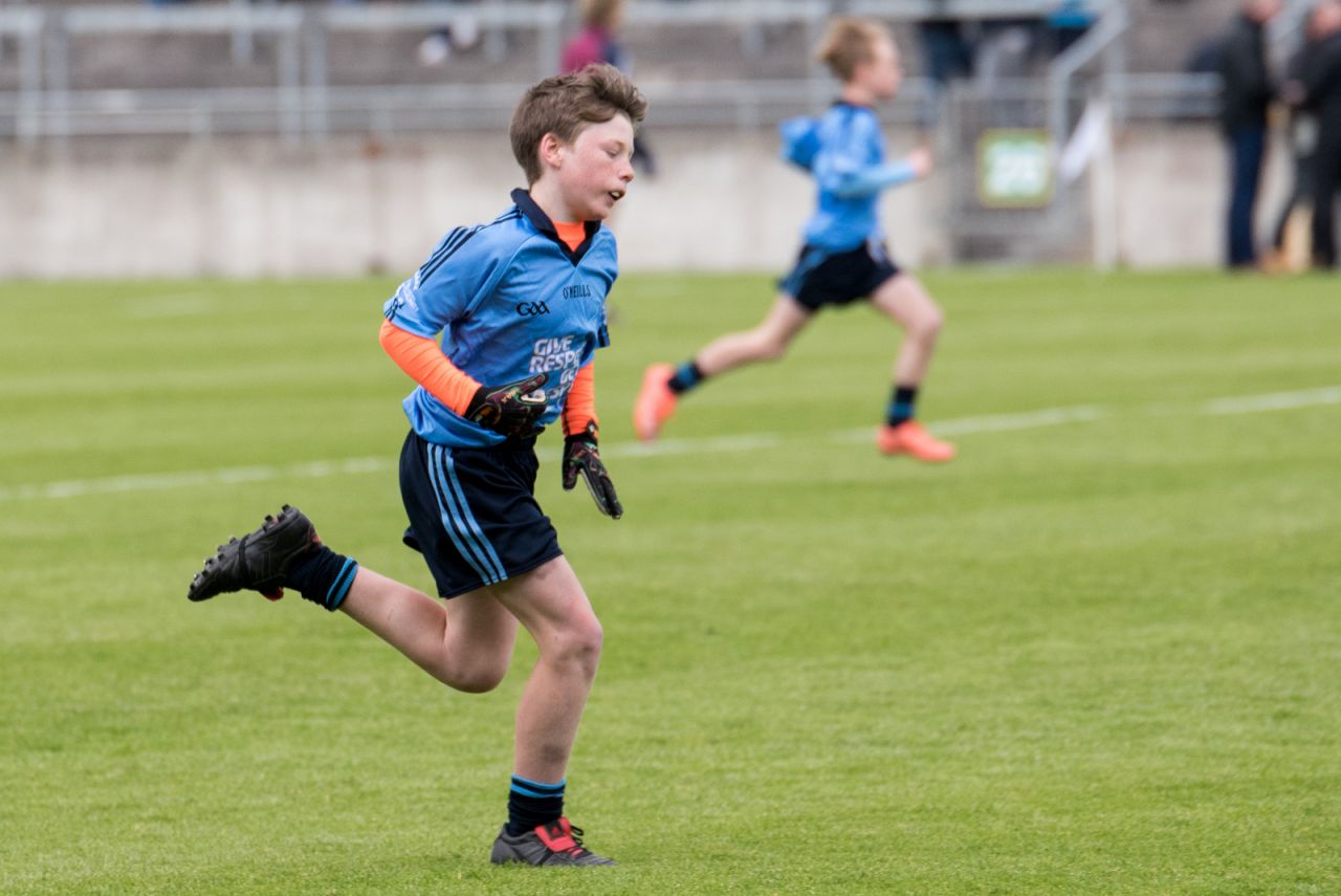 U12 Footballers Play at Half time in All Ireland U21 Football Final