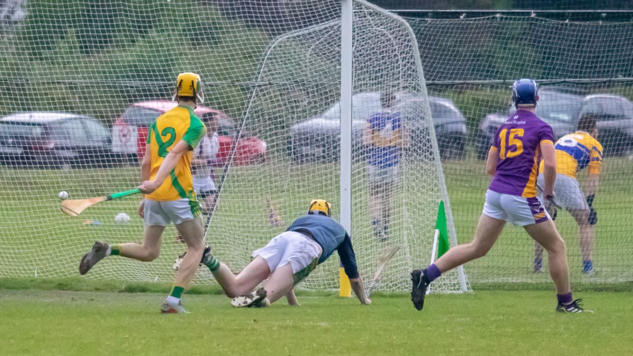 Crokes beat Faughs in torrential rain