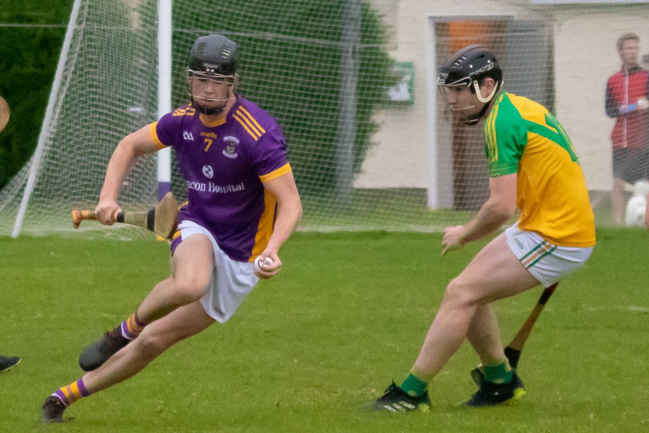 Crokes beat Faughs in torrential rain