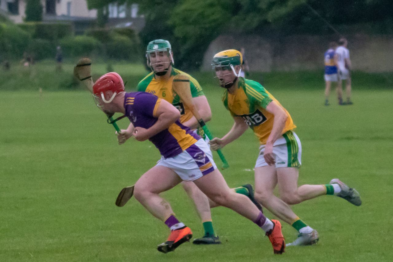 Crokes beat Faughs in torrential rain