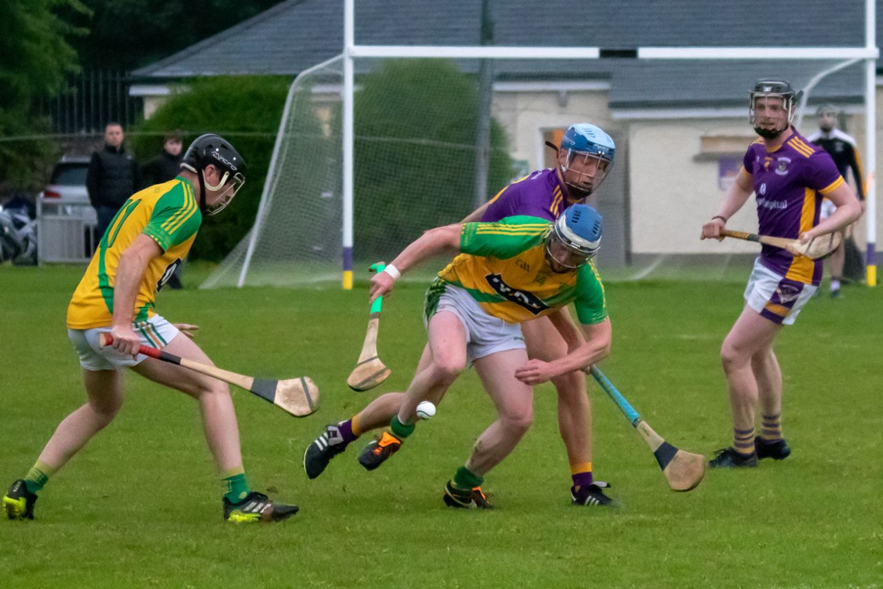 Crokes beat Faughs in torrential rain