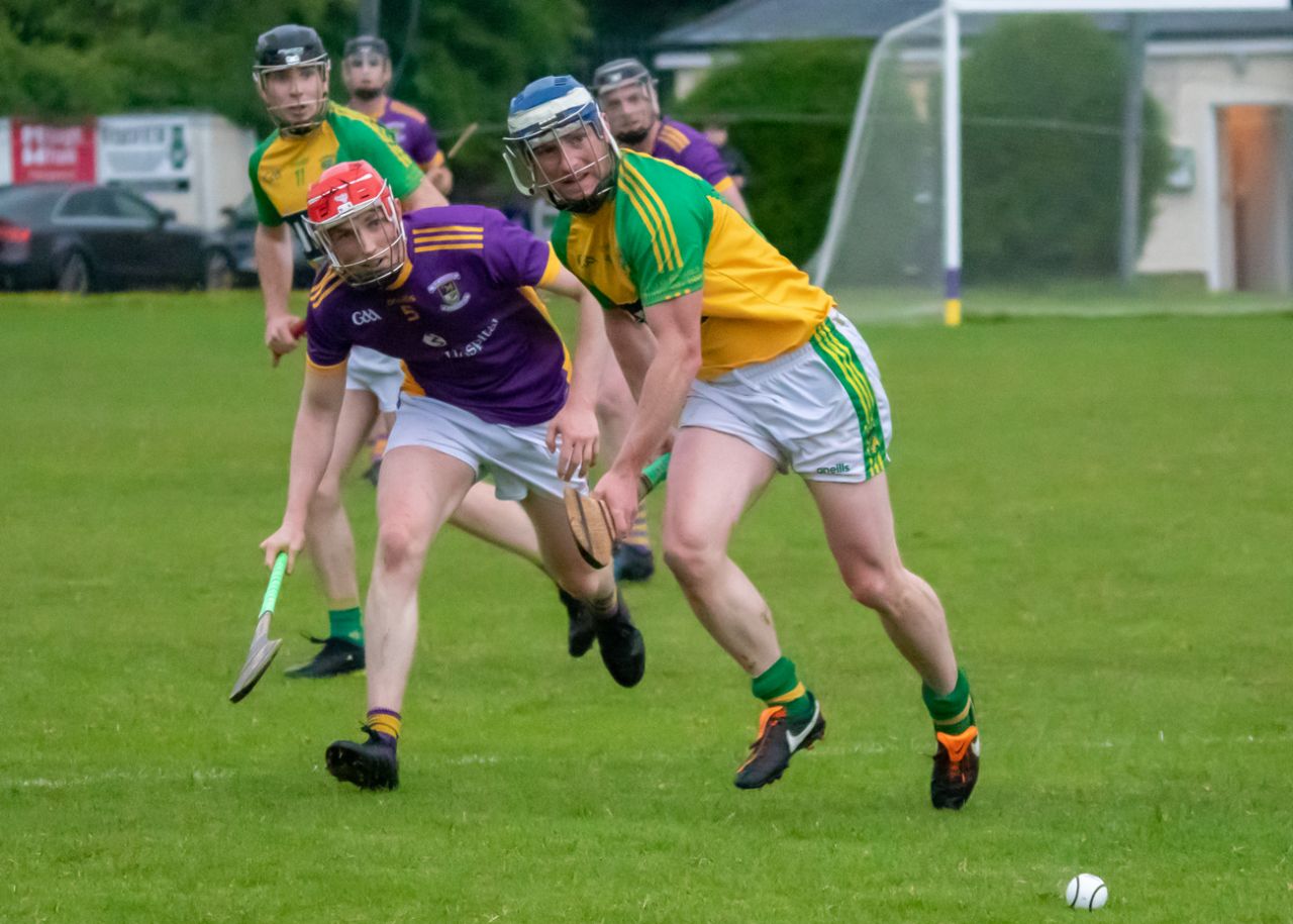 Crokes beat Faughs in torrential rain