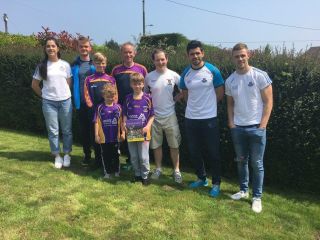 "Faces Behind the Purple & Gold" launched to great acclaim