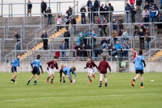 U12 Footballers Play at Half time in All Ireland U21 Football Final