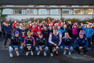 Kilmacud Crokes County Champions Footballers and Hurlers Visit Scoil San Treasa