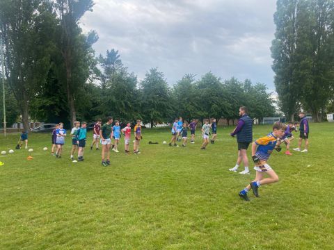 AFL 1/2 Coaching our Under age players