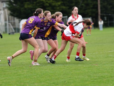 Three Kilmacud players tackle Whitehall no 4